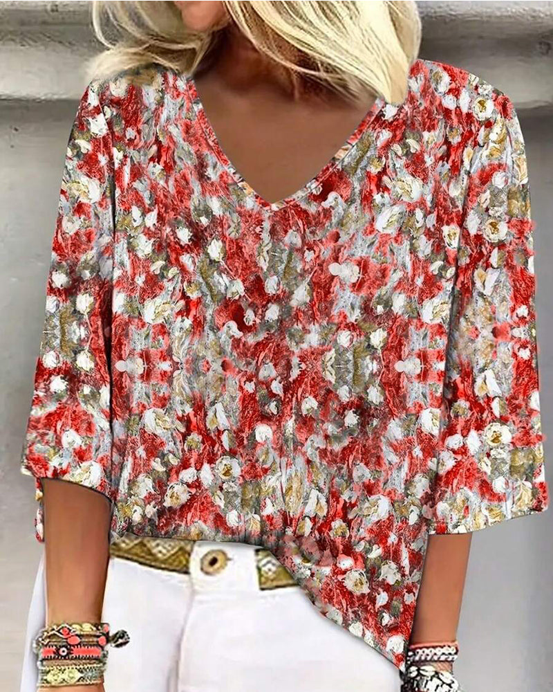 Bluse mit Blumendruck, V-Ausschnitt und dreiviertellangen Ärmeln