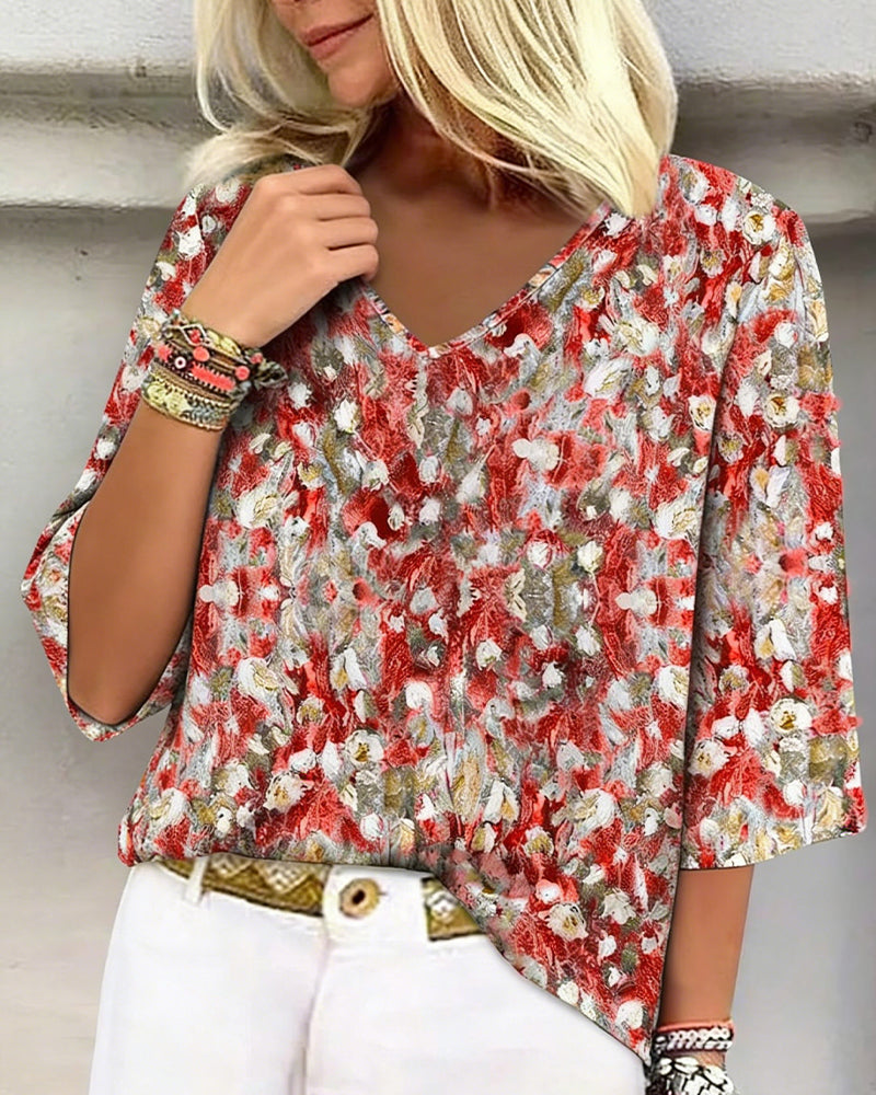 Bluse mit Blumendruck, V-Ausschnitt und dreiviertellangen Ärmeln