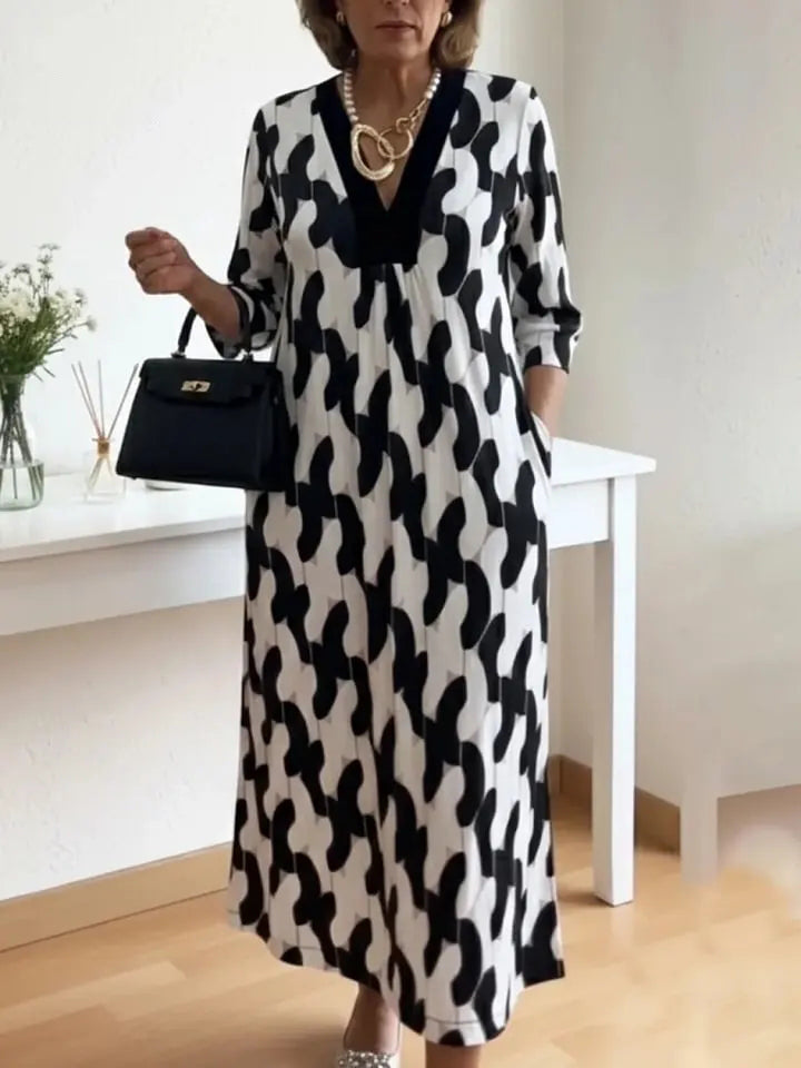 Elara – Midi Kleid mit künstlerischem Print und V-Ausschnitt