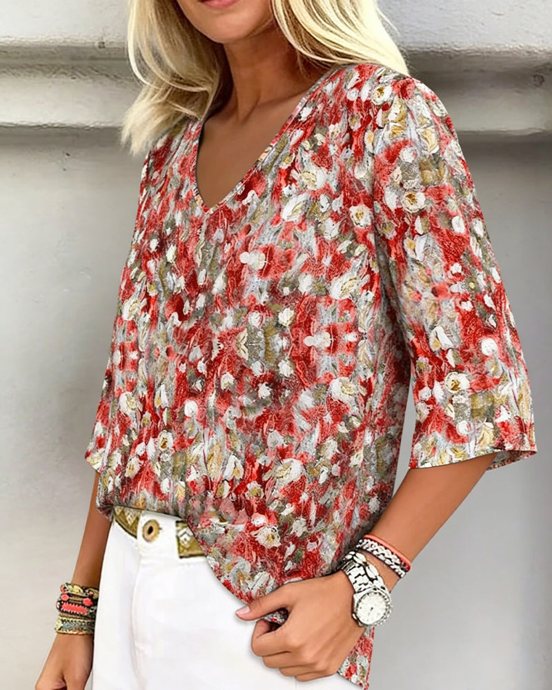 Bluse mit Blumendruck, V-Ausschnitt und dreiviertellangen Ärmeln