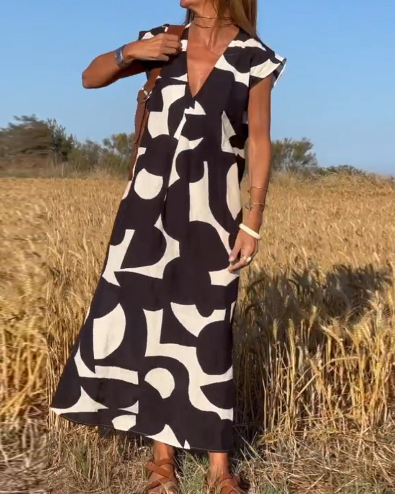 Elowen - Ärmelloses Kleid mit unregelmäßigem geometrischem Druck