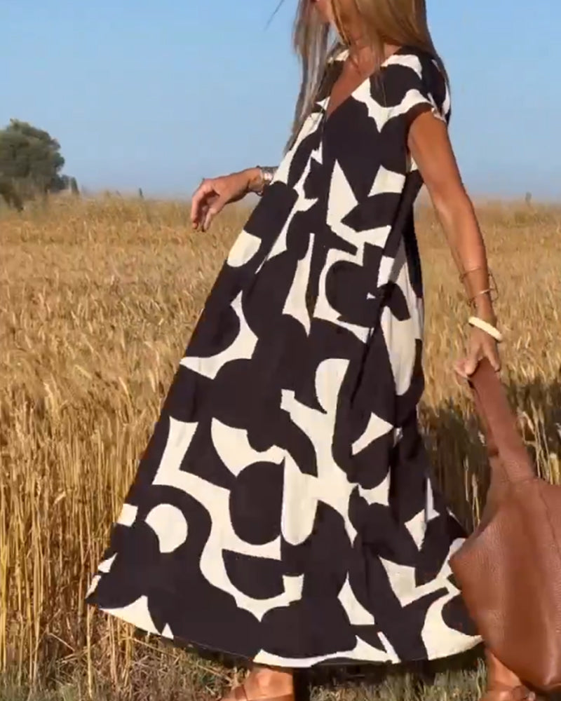 Elowen - Ärmelloses Kleid mit unregelmäßigem geometrischem Druck