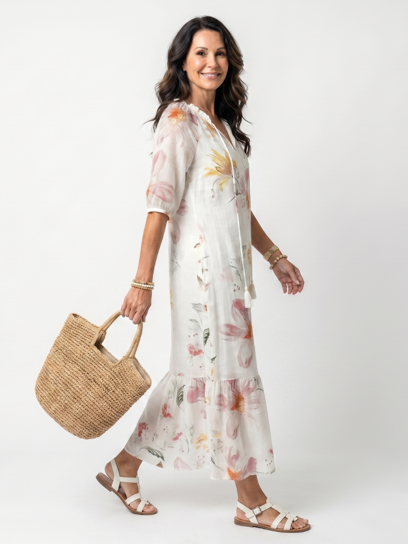 Noa | Midi-Kleid mit zarten Blumenmustern, Stufenschnitt und Quasten