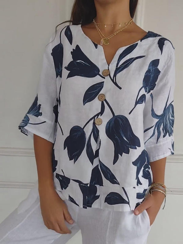 Despoina – Elegantes Blumentop mit Knöpfen