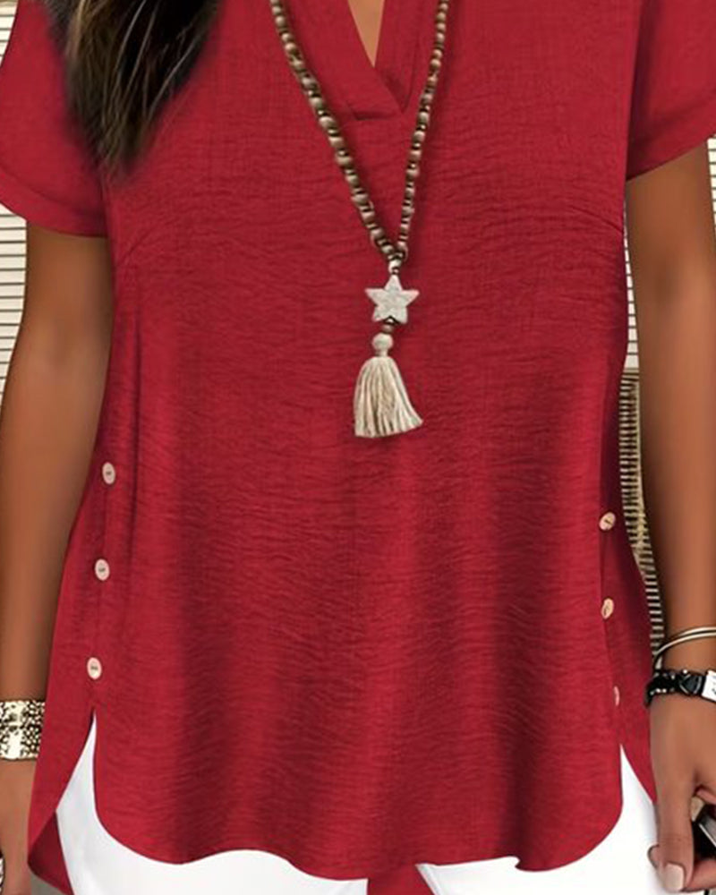 Unifarbene Bluse mit Seitenschlitz und kurzen Ärmeln