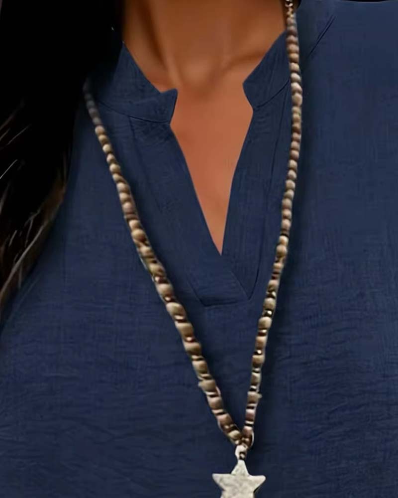 Unifarbene Bluse mit Seitenschlitz und kurzen Ärmeln