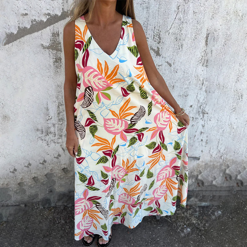YLVA I MAXIKLEID MIT V-AUSSCHNITT