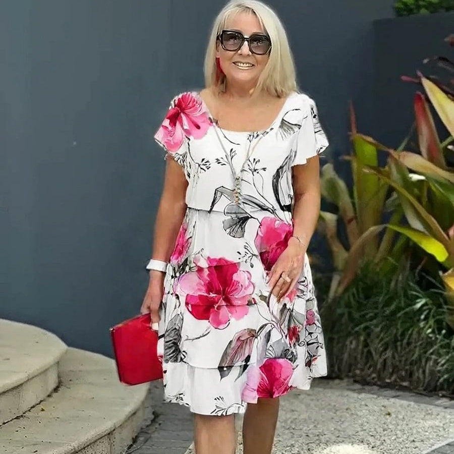 HELMINE I MEHRLAGIGES GEBLÜMTES KLEID